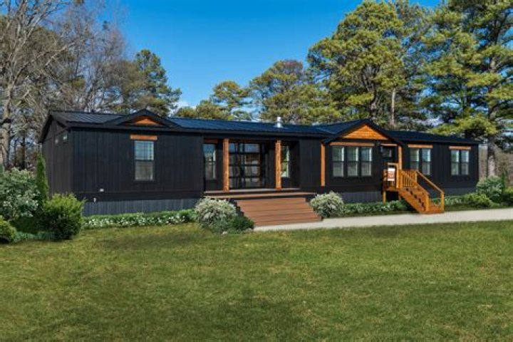 How do you classify a manufactured home as real property?