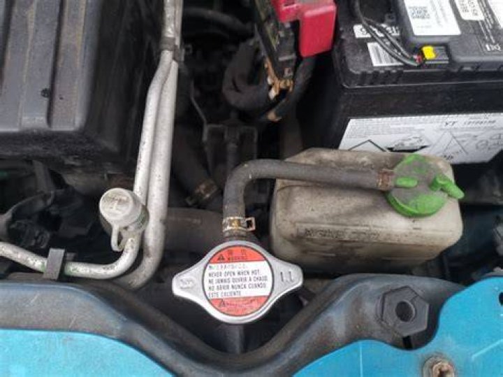 Where do you add water to your car?